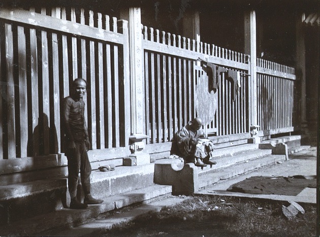 Buddhist priest in courtyard of temple, Canton