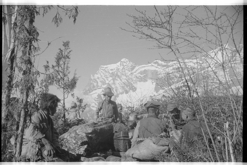 Funeral - People gathering at an altar with offerings - 