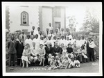 Group photograph with J.T. Hardyman and F. Carpenter in front of the London Missionary Society college, Imerimandroso, 25 July 1956