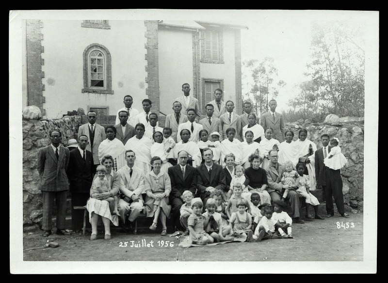 Group photograph with J.T. Hardyman and F. Carpenter in front of the London Missionary Society college, Imerimandroso, 25 July 1956 - 