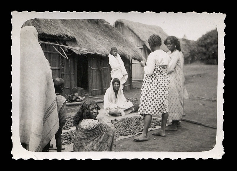 Women and a child in a village - 