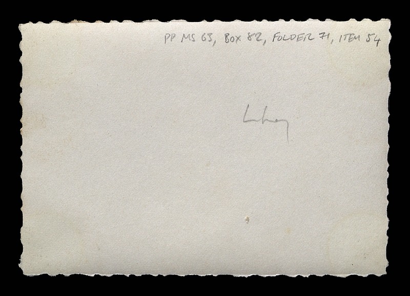 Women and a child in a village - 