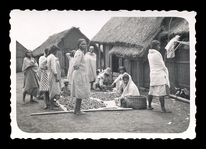 Women and a child in a village - 