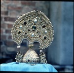 Gold mukuá¹­ studded with jewels used in the decoration of the deity of RÄdhÄramaá¹‡ temple