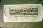 Last folio of a Sanskrit manuscript showing how a torn mÄrgin has been filled in with a frame of repair tissue