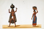 Male and female head-porters : from an album of Company paintings of occupations and festivals