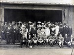 Photograph, group posed with a jockey, probably at Foochow racecourse [Fuzhou, China]